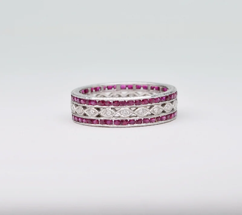 Bold geometric rings-18K white gold wedding band with 2 rows of Rubies framing one center row of diamonds