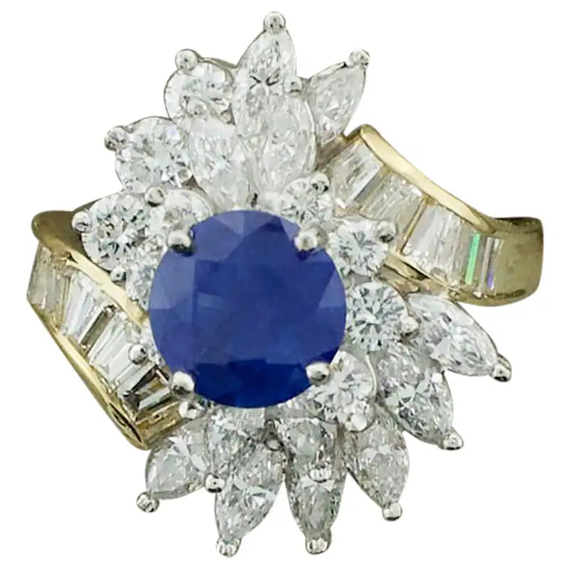 Bow motif rings-Sapphire and Diamond Cocktail Ring by Terrell & Zimmelman, circa 1970s