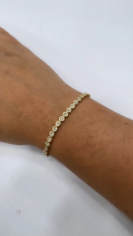 Sleek gold bangles-Gold and Diamond Bezel Tennis Bracelet