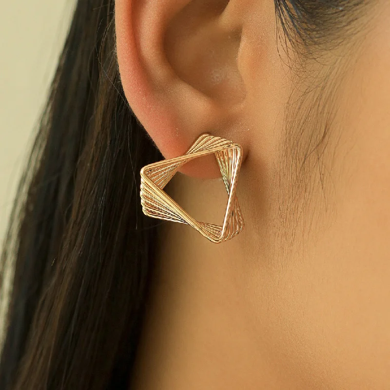 Java tile earrings-Contemporary Triangle Shape Twisted Stud Earrings