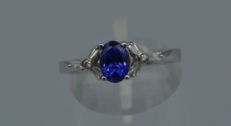 Full moon rings-14K white gold ring with one center oval Tanzanite and six side Diamond baguettes