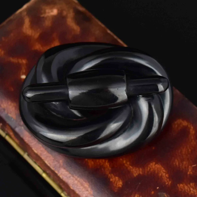 Full moon brooch-Antique Victorian Carved Whitby Jet Lovers Knot Brooch