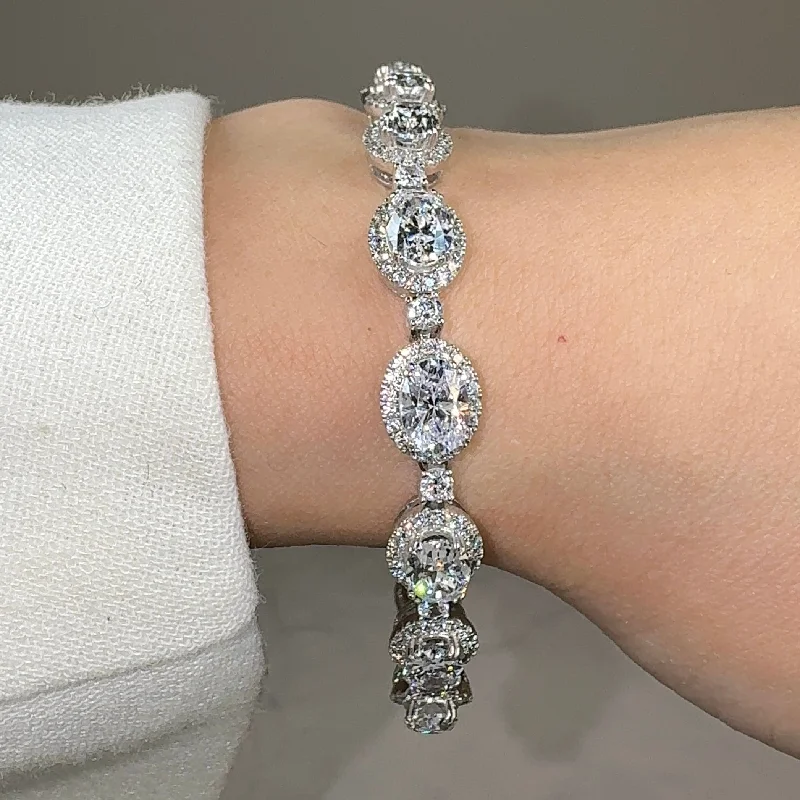 Tide pattern bangles-Oval Shape Halo 9 Carat Diamond Bracelet BRHAOC